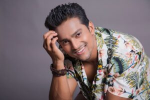 woman in yellow blue and green floral button up shirt