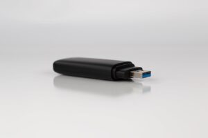a close up of a usb device on a white surface