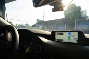 Inside a car looking at the gps.